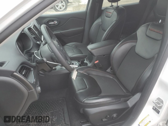 2022 Jeep Cherokee Trailhawk z VIN 1C4PJMBX2ND548837, wystawiony jako Copart lot #59042215 z przebiegiem 13 489 mil mil oraz Szkoda całkowita • Salvage title. Historia ofert i sprzedaży dostępna na DreamBid. Obrazek 7.