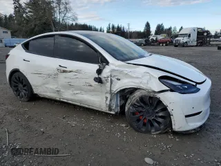 2022 Tesla Model Y Performance with VIN 7SAYGDEF2NF325084, listed as a Copart auction lot 44814525 with Not Provided miles and Salvage Title. Bid and sale history available at DreamBid. Image 4.