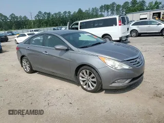 2013 Hyundai Sonata SE z VIN 5NPEC4AC2DH557370, wystawiony jako Copart lot #59120895 z przebiegiem 180 932 mil mil oraz Szkoda całkowita • Salvage title. Historia ofert i sprzedaży dostępna na DreamBid. Obrazek 13.