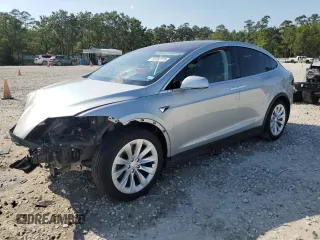 2018 Tesla Model X 75D with VIN 5YJXCBE23JF123533, listed as a Copart auction lot 50152775 with Not Provided miles and Salvage Title. Bid and sale history available at carsss.com. Image 1.