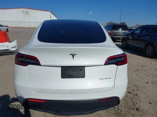 2023 Tesla Model Y Long Range with VIN 7SAYGAEE1PF828338, listed as a IAAI auction lot 40978725 with Not Provided miles and . Bid and sale history available at DreamBid. Image 17.