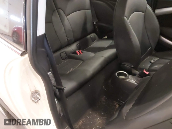 2009 MINI Hardtop S with VIN WMWMF73509TW85898, listed as a IAAI auction lot 41559954 with 97,186 mi miles and . Bid and sale history available at DreamBid. Image 8.