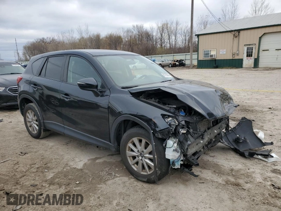 2016 Mazda CX-5 Touring z VIN JM3KE2CY0G0846699, wystawiony jako Copart lot #81785864 z przebiegiem 140 750 mil mil oraz Szkoda całkowita • Salvage title. Historia ofert i sprzedaży dostępna na DreamBid. Obrazek 4.