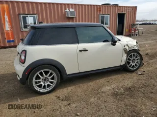 2013 MINI Hardtop S with VIN WMWSV3C54DT478670, listed as a Copart auction lot 52710445 with 58,974 mi miles and Salvage title. Bid and sale history available at DreamBid. Image 3.
