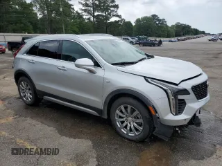 2020 Cadillac XT4 FWD Premium Luxury with VIN 1GYFZCR45LF027018, listed as a Copart auction lot 55537625 with 98,651 mi miles and Salvage title. Bid and sale history available at DreamBid. Image 4.