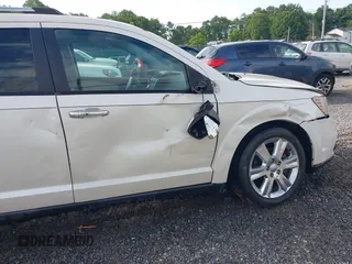 2013 Dodge Journey Crew with VIN 3C4PDDDG9DT685464, listed as a IAAI auction lot 42641982 with 155,901 mi miles and . Bid and sale history available at DreamBid. Image 18.