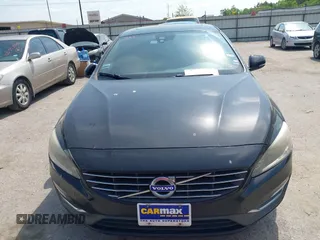 2015 Volvo S60 T5 Drive-E Premier with VIN YV126MFK6F1340578, listed as a IAAI auction lot 42047911 with 111,762 mi miles. Bid and sale history available at carsss.com. Image 6.