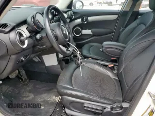 2015 MINI Hardtop 4 Door with VIN WMWXS5C51FT831167, listed as a Copart auction lot 52778685 with 52,770 mi miles and Salvage title. Bid and sale history available at DreamBid. Image 7.