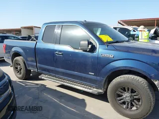 2015 Ford F-150 XL with VIN 1FTEX1CP0FKE14845, listed as a IAAI auction lot 42013909 with 162,644 mi miles. Bid and sale history available at carsss.com. Image 14.