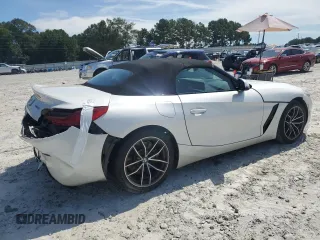 2022 BMW Z4 sDrive30i with VIN WBAHF3C05NWX38019, listed as a Copart auction lot 69311164 with 0 mi miles and Salvage Title. Bid and sale history available at carsss.com. Image 3.