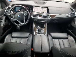 2020 BMW X5 xDrive40i with VIN 5UXCR6C09L9C95232, listed as a Copart auction lot 60697765 with 30,017 mi miles and Salvage title. Bid and sale history available at DreamBid. Image 8.
