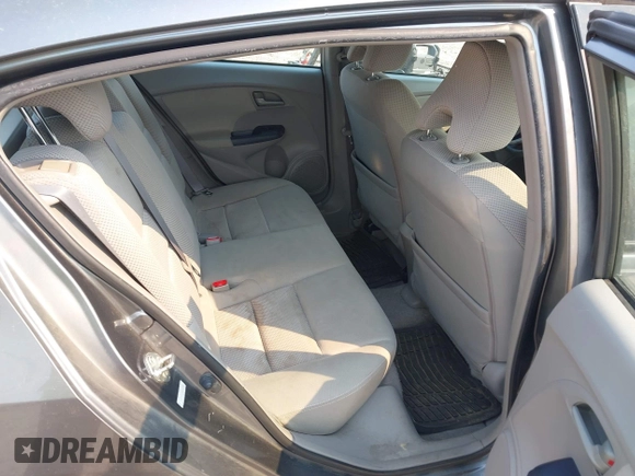 2010 Honda Insight EX with VIN JHMZE2H75AS027964, listed as a IAAI auction lot 41889301 with 136,485 mi miles and . Bid and sale history available at DreamBid. Image 8.