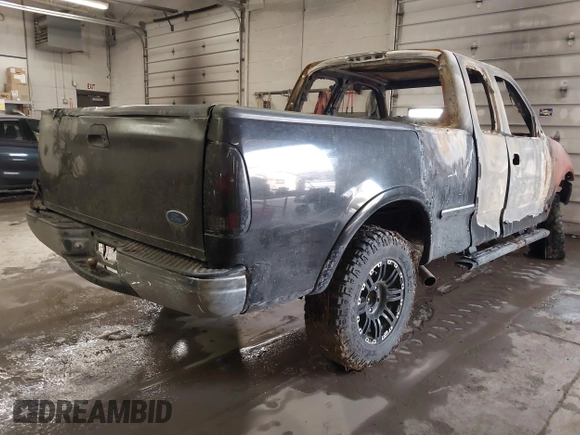 1997 Ford F-150 XL with VIN 1FTEX18L1VKD71217, listed as a IAAI auction lot 41251054 with 194,961 mi miles. Bid and sale history available at carsss.com. Image 4.