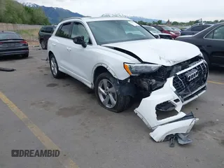 2021 Audi Q3 Premium with VIN WA1AUCF39M1068531, listed as a IAAI auction lot 42289153 with 96,275 mi miles and . Bid and sale history available at DreamBid. Image 1.