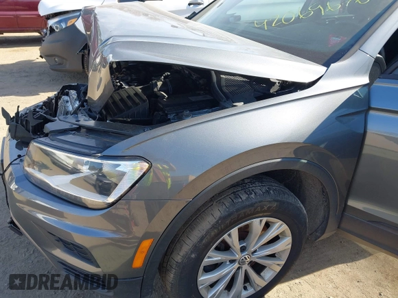 2019 Volkswagen Tiguan S with VIN 3VV0B7AX0KM119702, listed as a IAAI auction lot 42069676 with 69,637 mi miles and . Bid and sale history available at DreamBid. Image 17.