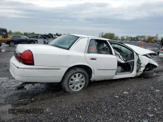 2003 Mercury Grand Marquis LS Premium with VIN 2MEFM75W13X667779, listed as a Copart auction lot 52869985 with 127,506 mi miles and Salvage Title. Bid and sale history available at DreamBid. Image 3.