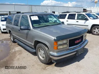 1999 GMC Suburban with VIN 3GKEC16R2XG514970, listed as a IAAI auction lot 42227606 with 182,145 mi miles and . Bid and sale history available at DreamBid. Image 1.