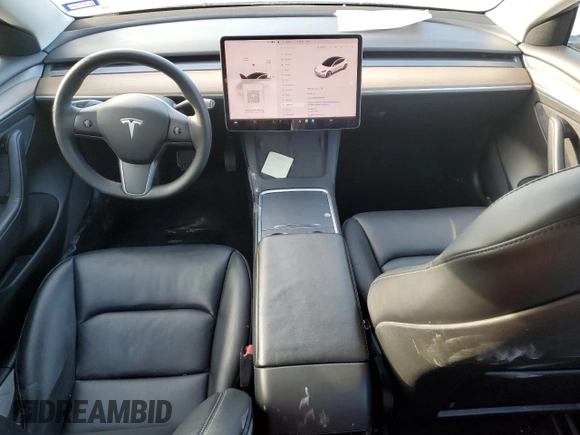 2022 Tesla Model 3 with VIN 5YJ3E1EA7NF184741, listed as a Copart auction lot 82487494 with 133,215 mi miles and Clean Title. Bid and sale history available at DreamBid. Image 8.