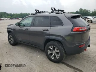 2014 Jeep Cherokee Trailhawk z VIN 1C4PJMBS9EW159721, wystawiony jako Copart lot #60719525 z przebiegiem 136 807 mil mil oraz Szkoda całkowita • Salvage title. Historia ofert i sprzedaży dostępna na DreamBid. Obrazek 2.