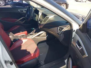2012 Hyundai Veloster w/Black Int z VIN KMHTC6AD4CU078413, wystawiony jako IAAI lot #42611032 z przebiegiem 142 295 mil mil oraz . Historia ofert i sprzedaży dostępna na DreamBid. Obrazek 5.