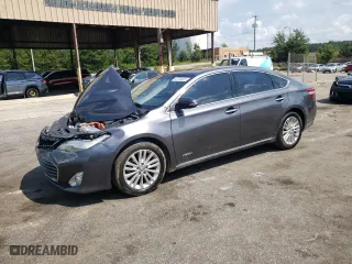 2015 Toyota Avalon Hybrid XLE Touring with VIN 4T1BD1EB5FU047289, listed as a Copart auction lot 63704623 with 176,616 mi miles. Bid and sale history available at carsss.com. Image 1.