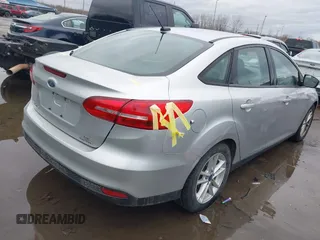 2016 Ford Focus SE with VIN 1FADP3F28GL386303, listed as a IAAI auction lot 41905397 with 158,112 mi miles. Bid and sale history available at carsss.com. Image 4.
