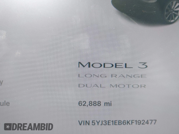 2019 Tesla Model 3 Long Range with VIN 5YJ3E1EB6KF192477, listed as a IAAI auction lot 41981600 with 62,888 mi miles. Bid and sale history available at carsss.com. Image 7.