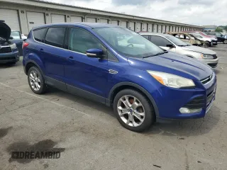 2013 Ford Escape SEL with VIN 1FMCU9H99DUD88204, listed as a Copart auction lot 64165335 with 185,818 mi miles and Clean title. Bid and sale history available at DreamBid. Image 4.