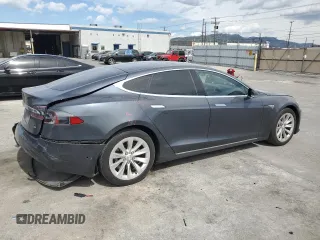 2016 Tesla Model S 70 with VIN 5YJSA1E1XGF149430, listed as a Copart auction lot 51339015 with 104,917 mi miles and Salvage title. Bid and sale history available at DreamBid. Image 3.