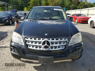 2011 Mercedes-Benz M 350 with VIN 4JGBB2FB5BA744077, listed as a Copart auction lot 61565615 with 125,813 mi miles and Salvage title. Bid and sale history available at DreamBid. Image 5.