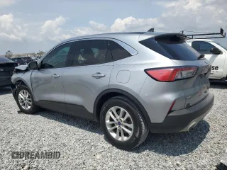 2021 Ford Escape SE z VIN 1FMCU0G64MUA91313, wystawiony jako Copart lot #56318425 z przebiegiem Nie podano mil oraz Szkoda całkowita • Salvage title. Historia ofert i sprzedaży dostępna na DreamBid. Obrazek 2.