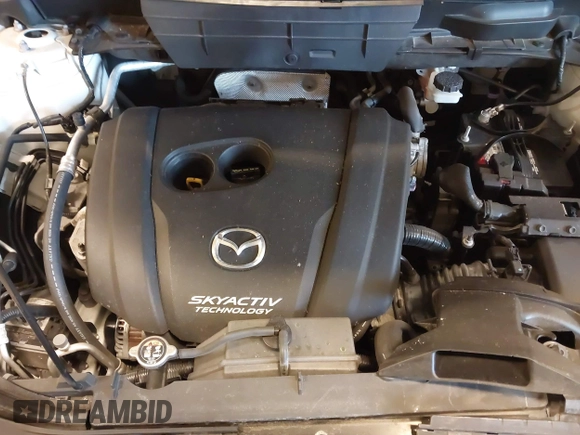 2018 Mazda CX-5 S Premium with VIN JM3KFBDM1J1412088, listed as a IAAI auction lot 41497431 with 65,532 mi miles and . Bid and sale history available at DreamBid. Image 10.