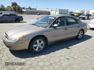 2002 Ford Taurus SES Standard z VIN 1FAFP55UX2G232846, wystawiony jako Copart lot #56989085 z przebiegiem 106 298 mil mil oraz Szkoda całkowita • Salvage title. Historia ofert i sprzedaży dostępna na DreamBid. Obrazek 1.