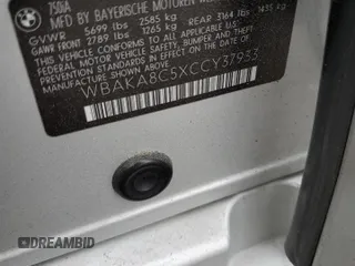 2012 BMW 7 Series 750i z VIN WBAKA8C5XCCY37933, wystawiony jako Copart lot #53122875 z przebiegiem Nie podano mil oraz Nie do naprawy • Non repairable. Historia ofert i sprzedaży dostępna na DreamBid. Obrazek 13.