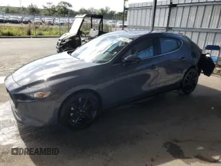 2024 Mazda 3 S Carbon Edition with VIN JM1BPBLM3R1709768, listed as a Copart auction lot 57072455 with 3,815 mi miles and Clean title. Bid and sale history available at DreamBid. Image 2.