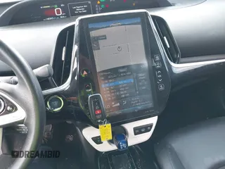 2017 Toyota Prius Plus with VIN JTDKARFP5H3061952, listed as a IAAI auction lot 42217235 with 148,343 mi miles and . Bid and sale history available at DreamBid. Image 11.