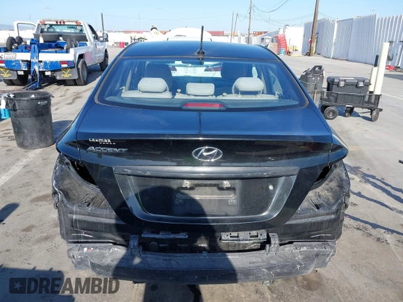 2016 Hyundai Accent SE z VIN KMHCT4AE9GU085523, wystawiony jako IAAI lot #42208002 z przebiegiem 94 653 mil mil oraz . Historia ofert i sprzedaży dostępna na DreamBid. Obrazek 16.