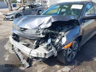 2017 Honda Civic EX-T with VIN 2HGFC1F33HH650782, listed as a IAAI auction lot 41685090 with 113,319 mi miles and . Bid and sale history available at carsss.com. Image 6.