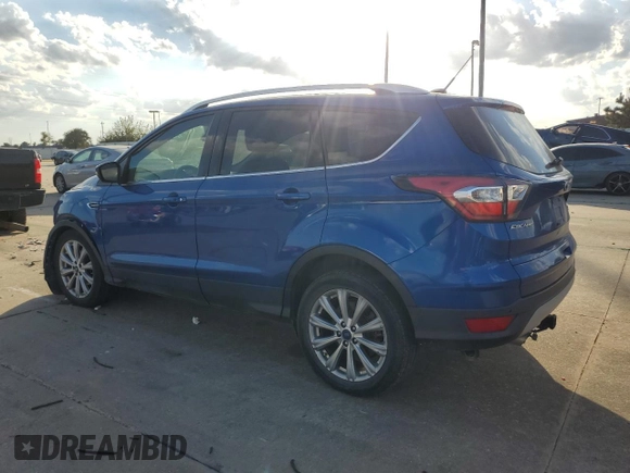 2017 Ford Escape Titanium with VIN 1FMCU0JD2HUB21261, listed as a Copart auction lot 76607264 with 130,796 mi miles and Salvage Title. Bid and sale history available at carsss.com. Image 2.