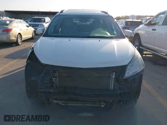 2015 Chevrolet Traverse LT with VIN 1GNKRHKD8FJ205055, listed as a IAAI auction lot 41825877 with 187,654 mi miles and . Bid and sale history available at DreamBid. Image 12.