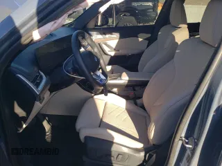 2024 BMW X1 xDrive28i with VIN WBX73EF00R5Z58004, listed as a Copart auction lot 49554055 with 4,053 mi miles and Salvage title. Bid and sale history available at DreamBid. Image 7.