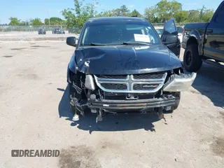 2014 Dodge Journey SXT with VIN 3C4PDCBG5ET250732, listed as a IAAI auction lot 41900940 with 144,301 mi miles. Bid and sale history available at carsss.com. Image 6.