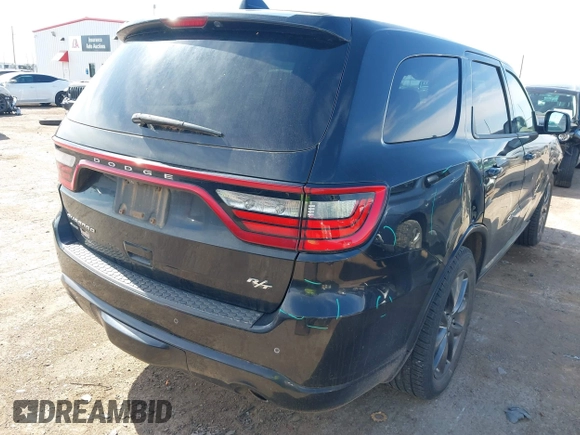 2014 Dodge Durango R/T with VIN 1C4SDJCT5EC477196, listed as a IAAI auction lot 42238097 with 167,665 mi miles and . Bid and sale history available at DreamBid. Image 4.