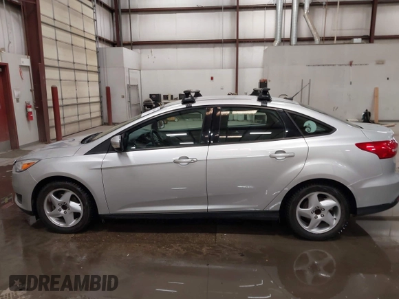 2015 Ford Focus SE with VIN 1FADP3F28FL231684, listed as a IAAI auction lot 41914284 with 100,195 mi miles. Bid and sale history available at carsss.com. Image 14.