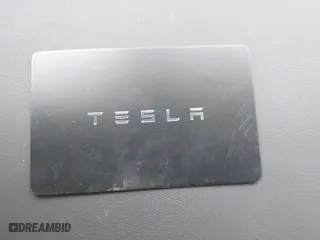 2023 Tesla Model 3 with VIN 5YJ3E1EA9PF569494, listed as a IAAI auction lot 41798014 with 18,372 mi miles. Bid and sale history available at carsss.com. Image 11.