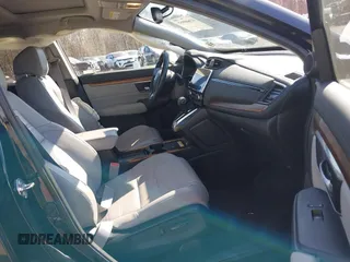 2020 Honda CR-V Touring with VIN 2HKRW2H98LH626651, listed as a IAAI auction lot 41668951 with 64,391 mi miles and . Bid and sale history available at DreamBid. Image 5.