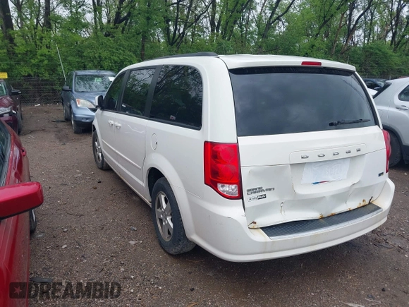 2012 Dodge Grand Caravan SXT with VIN 2C4RDGCG4CR145484, listed as a IAAI auction lot 42127663 with 278,872 mi miles and . Bid and sale history available at DreamBid. Image 3.