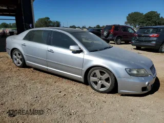 2004 Volkswagen Phaeton V8 z VIN WVWAF63D748010147, wystawiony jako Copart lot #75843654 z przebiegiem 147 157 mil mil oraz Nie do naprawy. Historia ofert i sprzedaży dostępna na DreamBid. Obrazek 4.