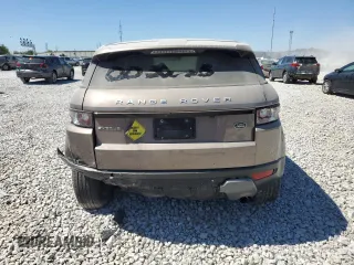 2015 Land Rover Range Rover Evoque Pure Premium z VIN SALVR2BG9FH005735, wystawiony jako Copart lot #69971924 z przebiegiem Nie podano mil oraz Szkoda całkowita • Salvage title. Historia ofert i sprzedaży dostępna na DreamBid. Obrazek 6.