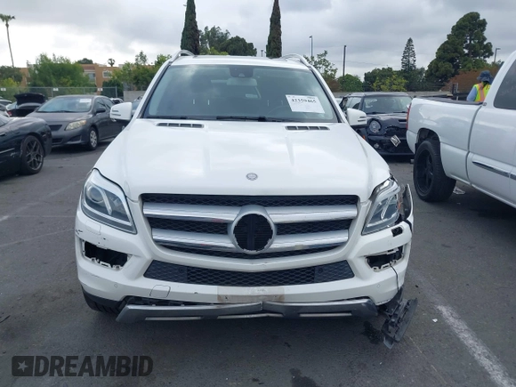 2014 Mercedes-Benz GL 450 z VIN 4JGDF7CE0EA424081, wystawiony jako IAAI lot #42359465 z przebiegiem 145 363 mil mil oraz . Historia ofert i sprzedaży dostępna na DreamBid. Obrazek 12.